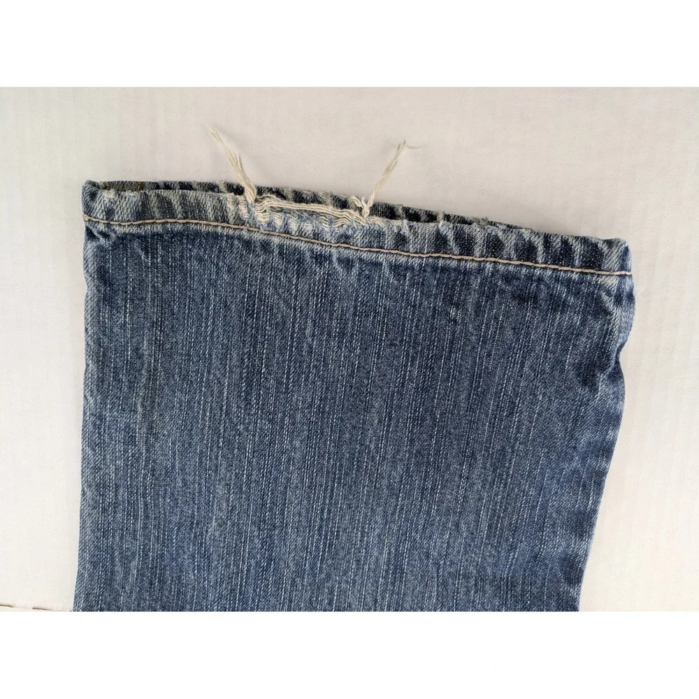 Ariat FR M4 Low Rise Boot Cut Jeans Mens 36x32 Blue Distressed Thrashed Workwear